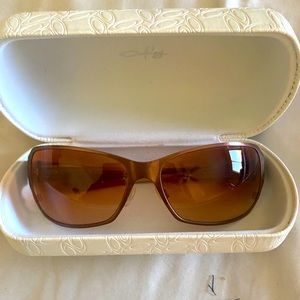 Brown pair of Oakley glasses